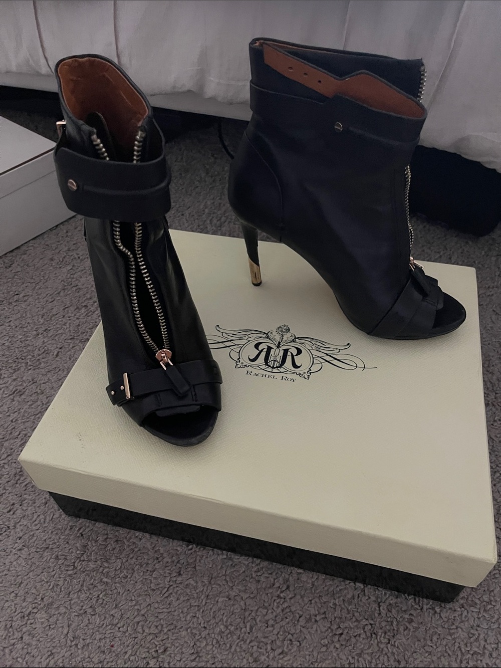 RACHEL Rachel Roy Black Leather Peep-Toe Ankle Booties with Gold Heel Accent